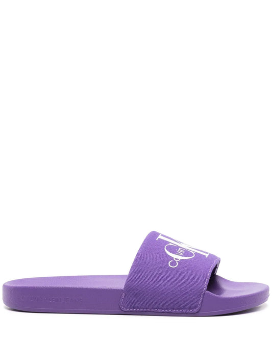 Calvin Klein Jeans logo-print canvas slides