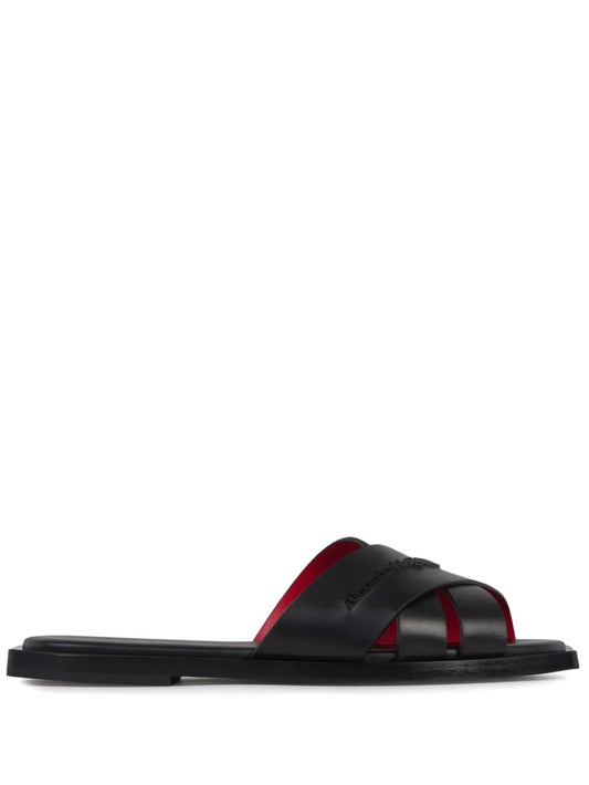 Alexander McQueen logo-embossed crossover-strap slides 